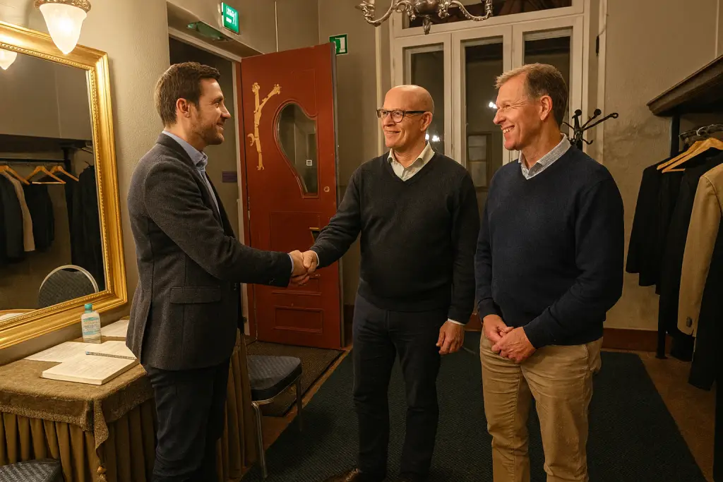 Loosin edustajat kättelevät uutta jäsentä ensimmäisessä tapaamisessa.